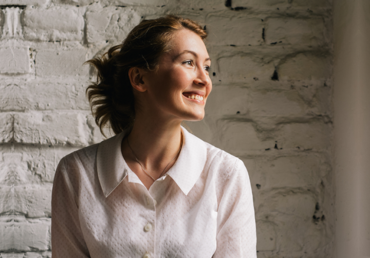 young woman smiling featured image